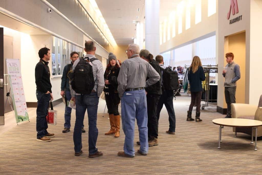 Hallway conversation at Eco-Ag Conference